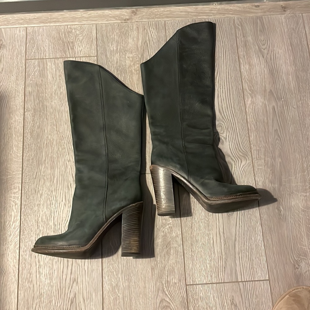 Pebbled black all leather high heeled boot